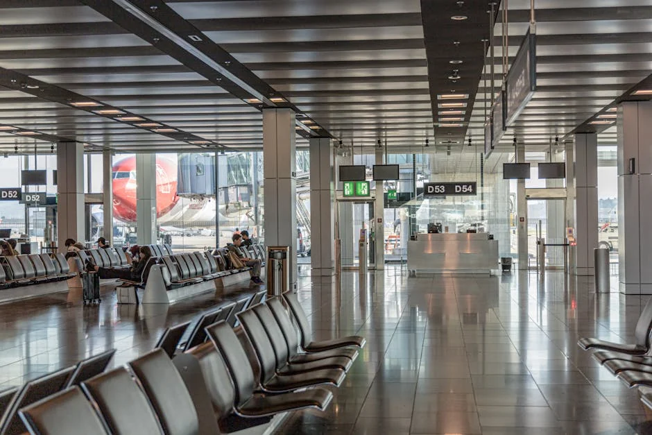Incheon International Airport terminal interior with departure boards and traveller silhouettes — editorial photograph for Seoul